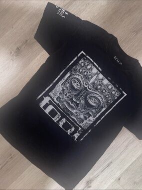 TOOL Black Short-Sleeve Graphic Tee with Intricate Mask Motif | Size Large